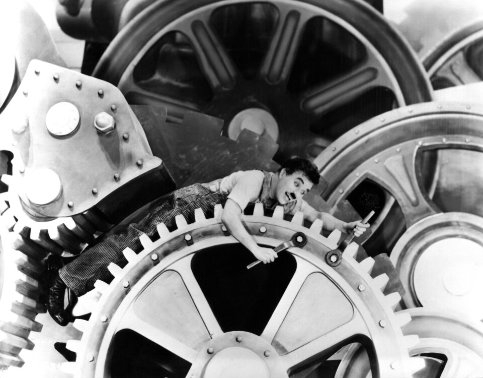 Charlie Chaplin i Moderna tider (1936). Foto: Mary Evans Picture Charlie Chaplin i Moderna tider (1936). Foto: Mary Evans Picture