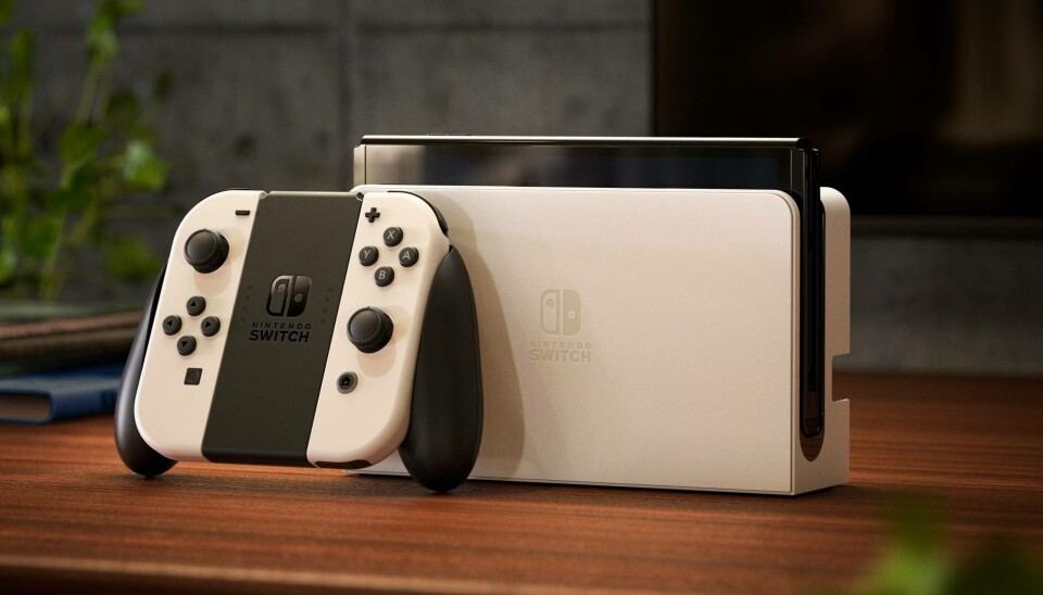 Oledmodellen av Nintendo Switch. Arkivbild. Oledmodellen av Nintendo Switch. Arkivbild.