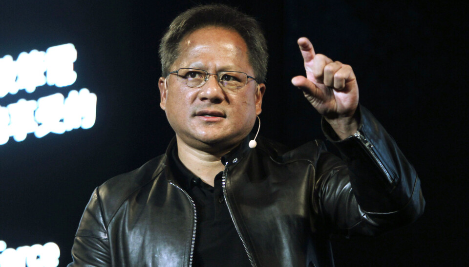 Nvidia vd Jensen Huang lyfter fram AI i företagets rapport. Arkivbild. Nvidia vd Jensen Huang