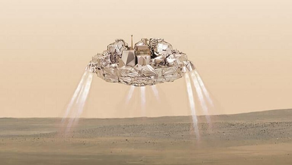 Så här skulle det enligt en illustration från ESA ha sett ut när Schiaparelli-modulen landar på Mars yta. Nu befaras den ha kraschat. Foto: ESA / ATG-medialab via AP / TT Så här skulle det enligt en illustration från ESA ha sett ut när Schiaparelli-modulen landar på Mars yta. Nu befaras den ha kraschat. Foto: ESA / ATG-medialab via AP / TT